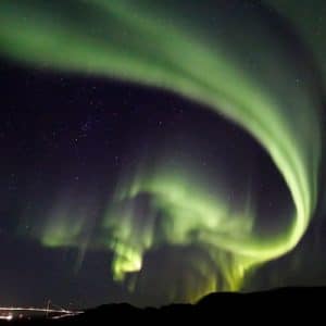 Rapidly moving curtains of aurora ripple across the sky over Rørvik, Norway. (Photo by Paul Deans/TQ)